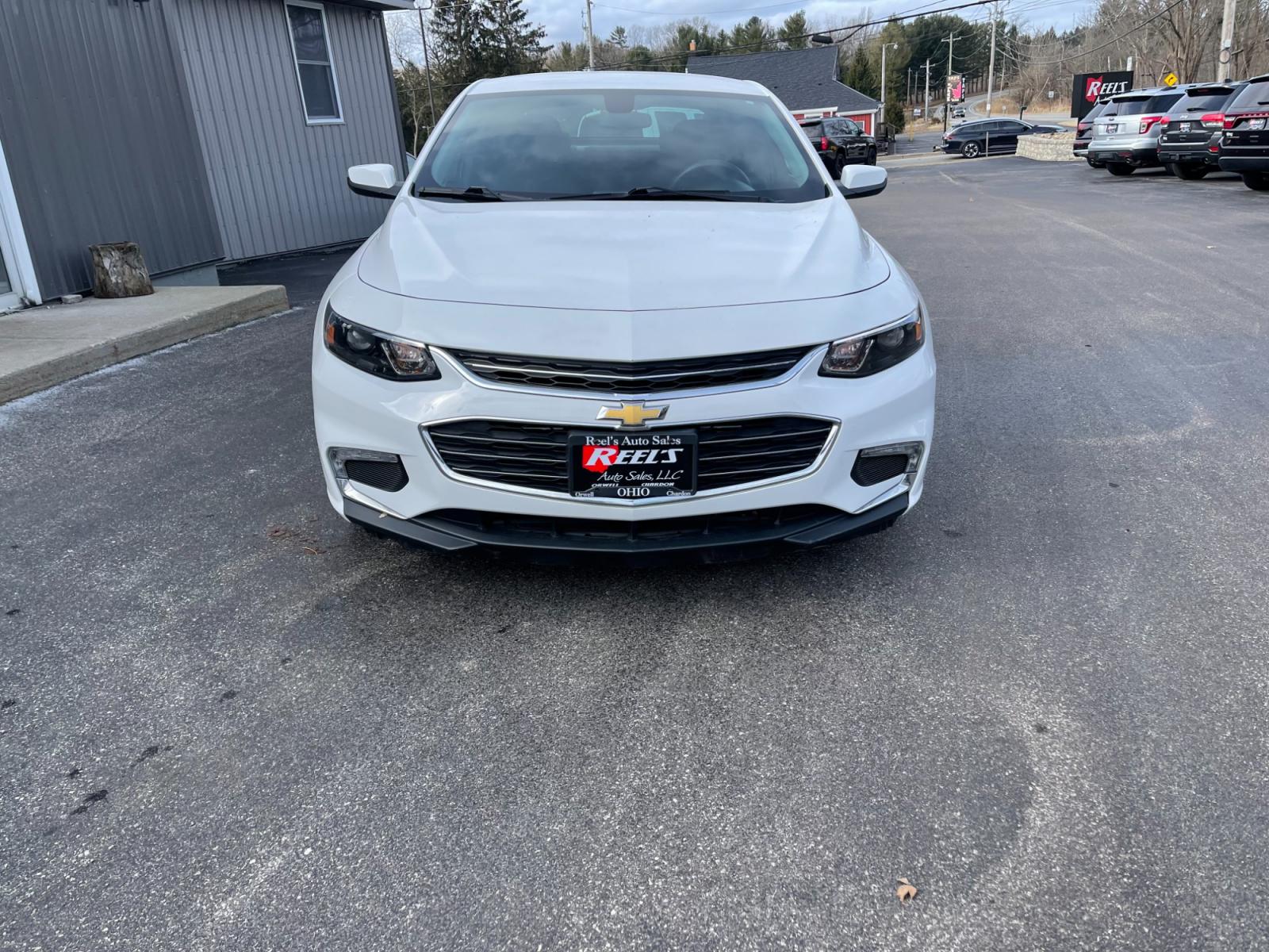 2016 White /Black Chevrolet Malibu 1LT (1G1ZE5ST7GF) with an 1.5L I4 DOHC 16V TURBO engine, 6A transmission, located at 11115 Chardon Rd. , Chardon, OH, 44024, (440) 214-9705, 41.580246, -81.241943 - This 2016 Chevrolet Malibu 1LT, is equipped with a 1.5L EcoTec engine and a 6-speed automatic transmission, offers a blend of efficiency and performance. It boasts modern amenities including a backup camera for enhanced safety during reversing, push-button start for convenience, and integrated Apple - Photo #1